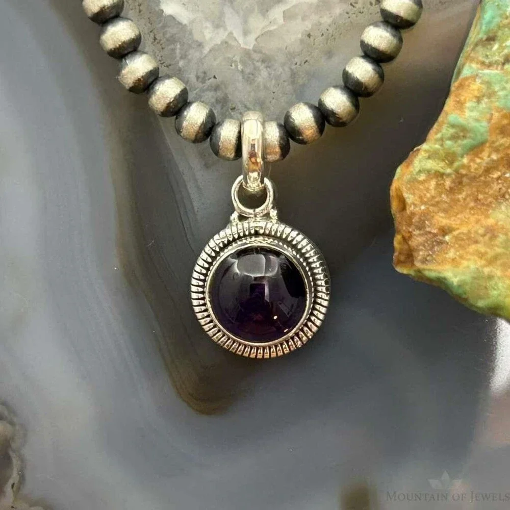 Sterling Southwestern Style Round Amethyst Decorated Charm/Pendant For Women